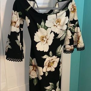 Black dress with white flowers.